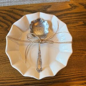 Elegant Cream Ceramic Plate with Silver Spoon